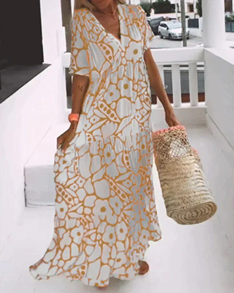 CHRISTINE™ | VESTIDO LARGO FLORAL CON ESCOTE EN V Y SILUETA LIGERA