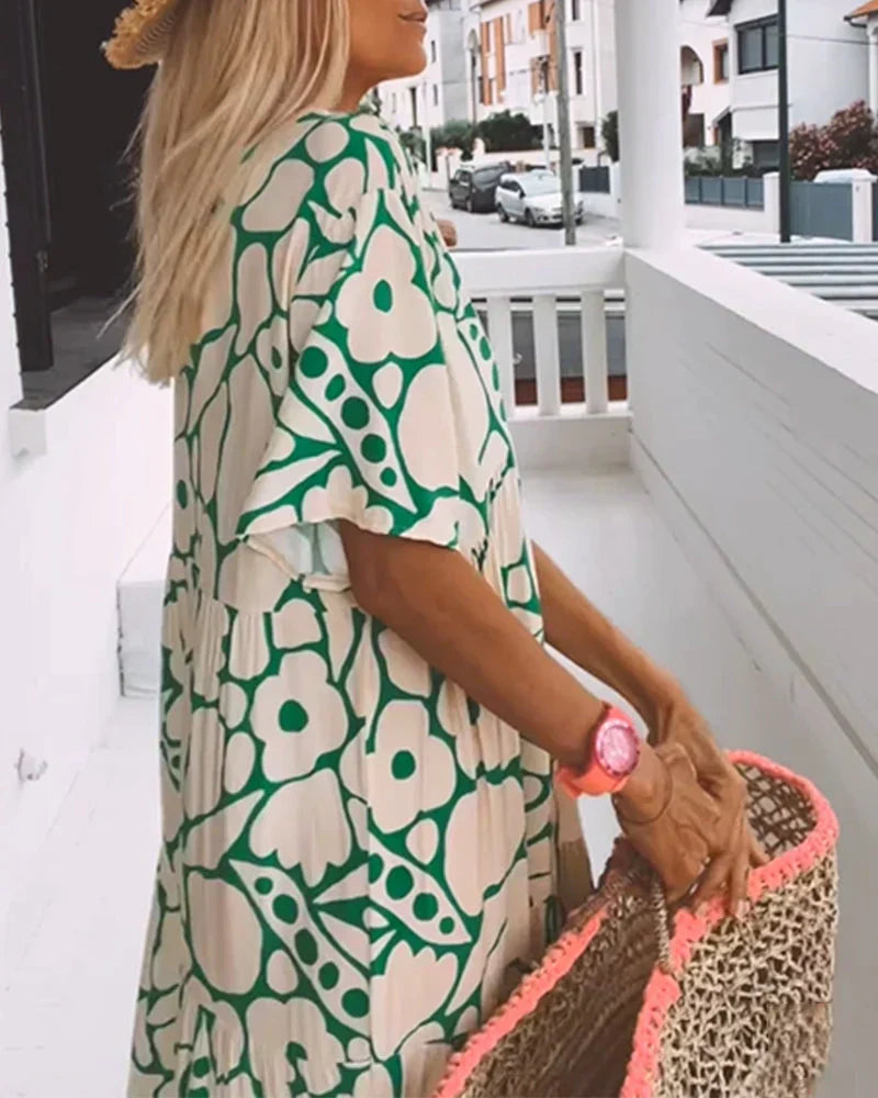 CHRISTINE™ | VESTIDO LARGO FLORAL CON ESCOTE EN V Y SILUETA LIGERA