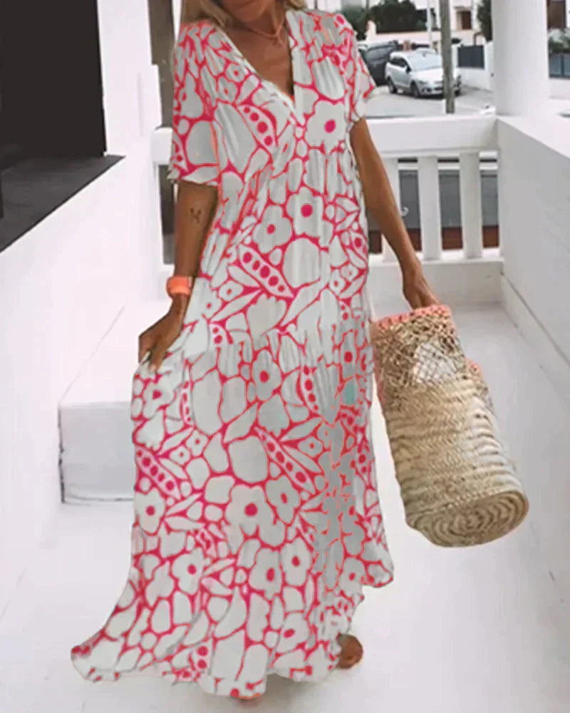 CHRISTINE™ | VESTIDO LARGO FLORAL CON ESCOTE EN V Y SILUETA LIGERA