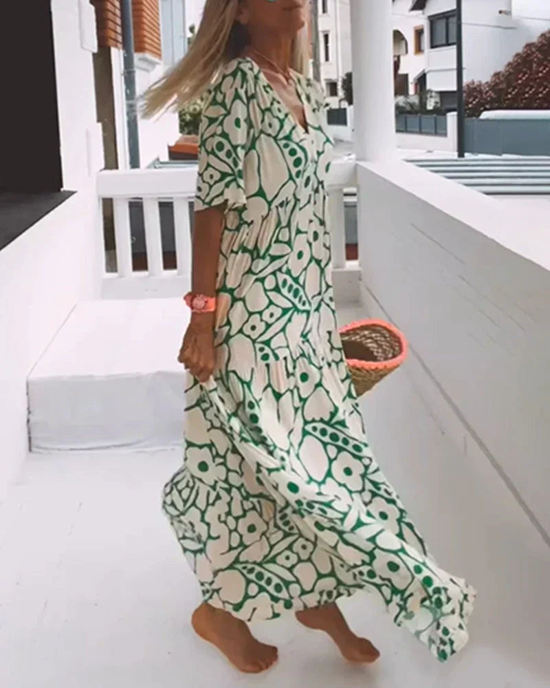 CHRISTINE™ | VESTIDO LARGO FLORAL CON ESCOTE EN V Y SILUETA LIGERA
