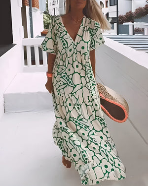 CHRISTINE™ | VESTIDO LARGO FLORAL CON ESCOTE EN V Y SILUETA LIGERA
