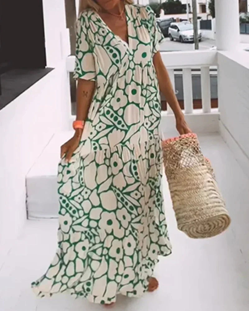 CHRISTINE™ | VESTIDO LARGO FLORAL CON ESCOTE EN V Y SILUETA LIGERA