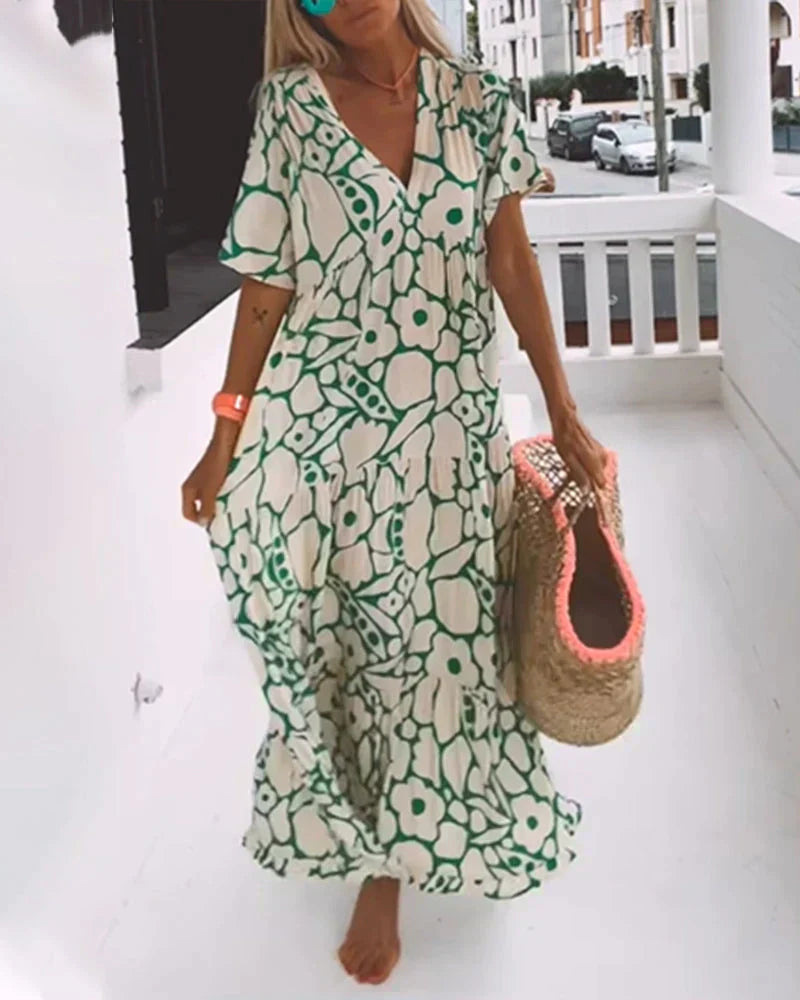 CHRISTINE™ | VESTIDO LARGO FLORAL CON ESCOTE EN V Y SILUETA LIGERA